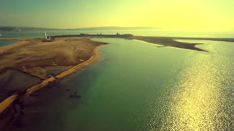 Aerial view of lighthouse on coastline Stock Footage 48909390
