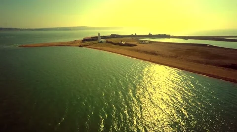 Aerial view of lighthouse on coastline Stock Footage 48909452