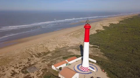 Aerial view of lighthouse of the Coubre, La palmyre, France Stock Footage 99408885