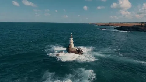 Aerial view of a lighthouse during summer day Stock Footage 143938453