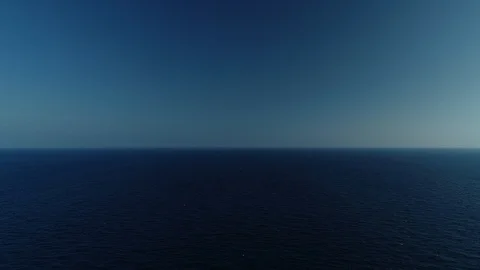 Aerial view of lighthouse on the edge of a cliff Stock Footage 120297852