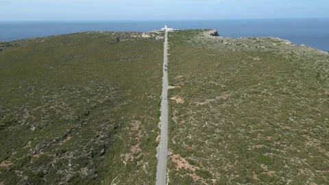 Aerial view of a lighthouse, Far de Cavalleria, Minorca, Islas Baleares, Spain Видео 303752842