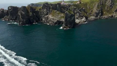 Aerial view, Lighthouse Gamow, Pacific Ocean, Boats, Bay Stock Footage 162641071