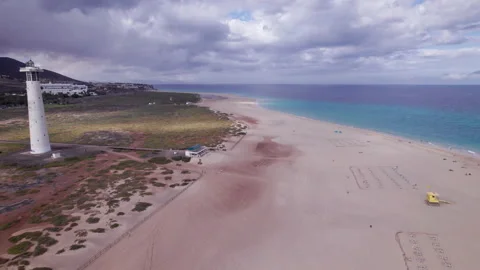 Aerial view of lighthouse at Morro Jable, Fuerteventura Stock Footage 310401241