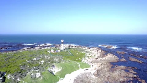 Aerial view of lighthouse, ocean and rocks 動画素材 201837533