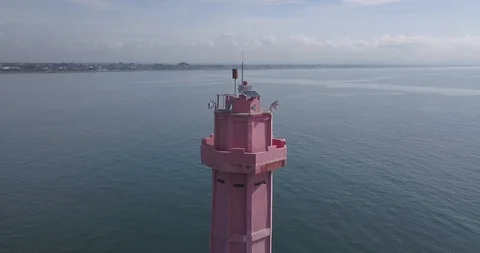 Aerial view of lighthouse in ocean Stock Footage 129746417