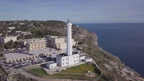 Aerial view of a lighthouse on the rocks, drone aerial shot on sunrise Stock Footage 85114871
