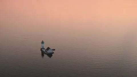 Aerial view of a lighthouse in the St. Lawrence River Video stock 341434870