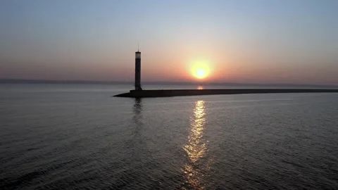 Aerial view of the lighthouse, in the sun. 動画素材 141862494