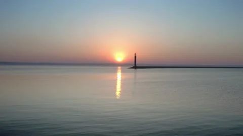 Aerial view of the lighthouse, in the sun. Video stock 142318168