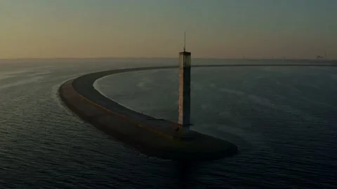 Aerial view of the lighthouse, in the sun. Видео 142318224