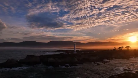 Aerial view of lighthouse at sunset, United States. Stock Footage 320473186
