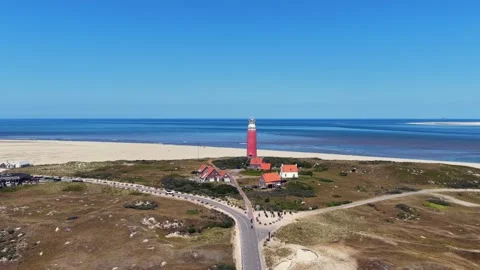 Aerial view of the lighthouse on Texel in the Netherlands Video stock 345572642