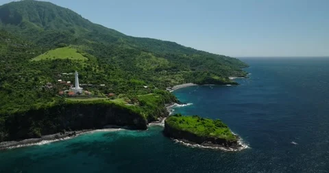 Aerial view of lighthouses perched on cliffs and islands in the ocean Stock Footage 274626167