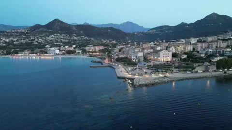 Aerial View of L’Île-Rousse Seafront and Mountains - Corsica - 4K Drone Video stock 310623984