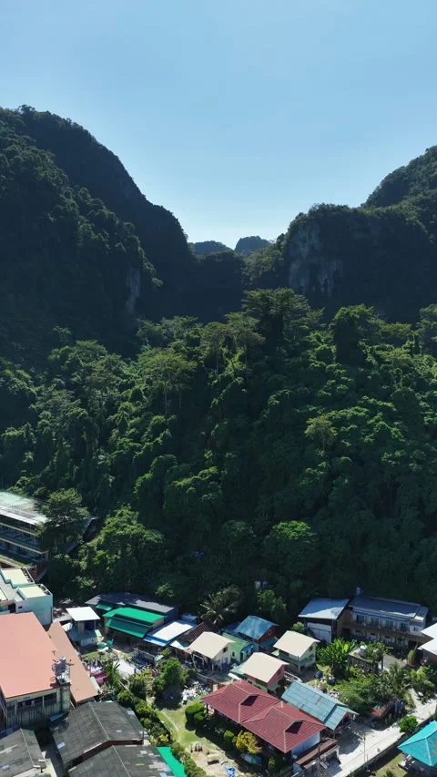 Aerial View of Limestone Cliffs and Village in Phuket Stock Footage 341495016