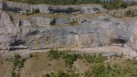 Aerial view of limestone cliffs in Baume les Messieurs blind valley, France Stock Footage 342313832