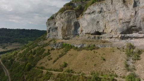 Aerial view of limestone cliffs in Baume les Messieurs blind valley, France Stock Footage 342313838