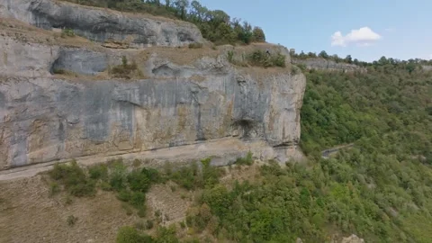 Aerial view of limestone cliffs in Baume les Messieurs blind valley, France Stock Footage 342313850