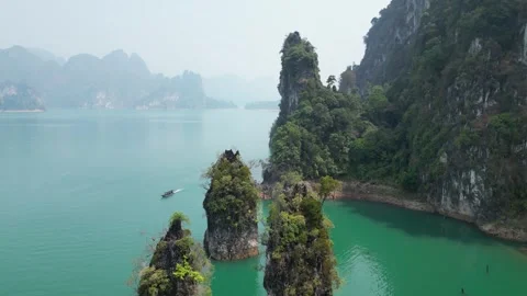 Aerial View of Limestone Cliffs in Cheow Lan Lake, Khao Sok, Thailand Stock Footage 335580623