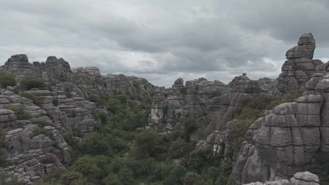 Aerial view of a limestone karst landscape with weathered rock towers Vídeos de archivo 342259771