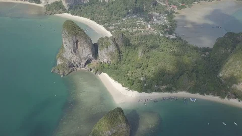 Aerial view of limestone rock, floating boats on Phra Nang bay, Krabi, Thailand. Video stock 121453790