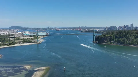 Aerial View of Lions Gate Bridge and Downtown Vancouver Skyline Over Burrar.. Stock Footage 329817735
