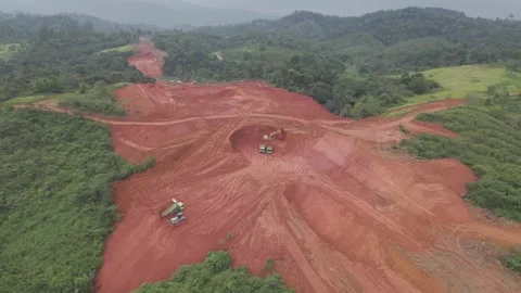 Aerial view of loading and unloading process for road construction Stock Footage 334272986