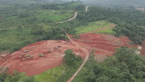 Aerial view of loading and unloading activities of trucks and excavators fo.. Stock Footage 334921824