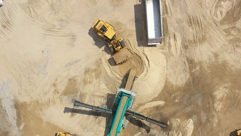 Aerial view loading bulldozer in open air quarry. Sand mining industry. Bulld Stock Footage 109345299