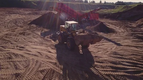 Aerial view of loading sand into trucks Stock Footage 80561065
