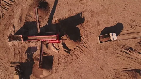 Aerial view of loading sand into trucks Video stock 80561475
