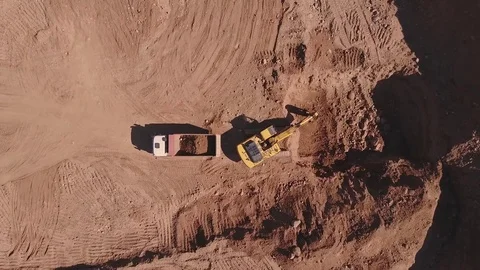 Aerial view of loading sand into trucks Stock Footage