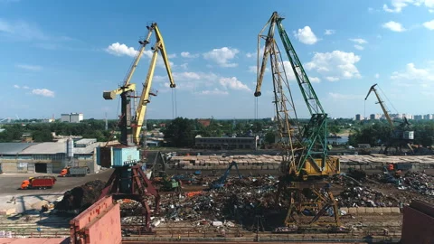 Aerial view on Loading of scrap metal in the river port Stock Footage 99961341