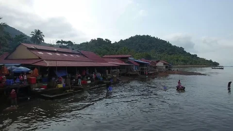 Aerial view of local people working at the crab market in Kep , Cambodia, Asia Stock Footage 83535964