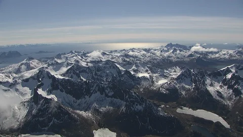 Aerial view of Lofoten with dramatic mountains,peaks &amp; open sea. Stock Footage 87728858