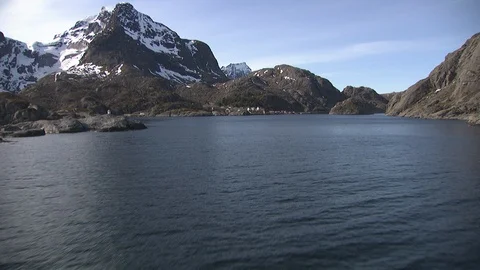 Aerial view of Lofoten with dramatic mountains,peaks &amp; open sea. Stock Footage 87728992