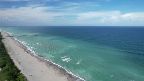Aerial view of Loggerhead Beach in Jupitor, FL. Crystal blue waters of the Ca Stock Footage 217389951