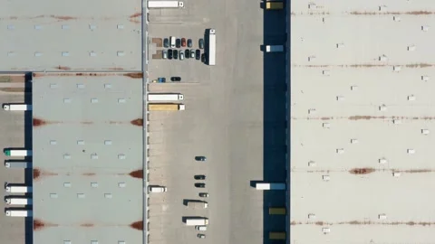 Aerial view of a logistics center with many trucks Stock Footage 225664355