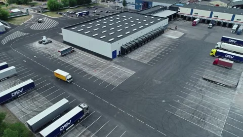 Aerial view of a logistics facility with parked trucks in Latvia. Stock Footage 340814591