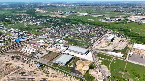 Aerial View of a Logistics Warehouse and Industrial Area Stock Footage 339245156