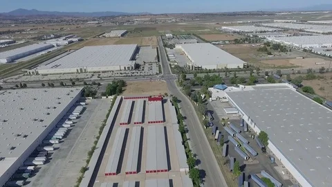 Aerial view of the logistics warehouse  with trailers waiting for loading Stock Footage 73739775