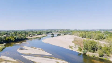 Aerial view of the Loire River flowing through a rural landscape near Stock Footage 346664498