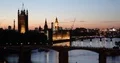 Aerial View of London Center Skyline with Parliament Houses Cars Traffic Dusk UK 4k or 4k+ Resolution