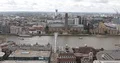 Aerial View of London City Skyline People Walk on Millennium Bridge Thames River 4k or 4k+ Resolution