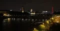 Aerial View of London City Skyline Landmarks Cars Traffic Crossing Bridge Night 4k or 4k+ Resolution
