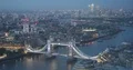 Aerial View of London City Skyline Office Towers and Tower Bridge Landmark Dusk 4k or 4k+ Resolution