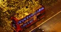 Aerial View of London Double Decker Bus Stop in Station Public Transport Night 4k or 4k+ Resolution