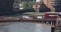 Aerial View of London Double Decker Bus Passing on Vauxhall Bridge Rush Hour Day 4k or 4k+ Resolution