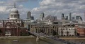Aerial View London Skyline Crowd of Commuters People Crossing Millennium Bridge 4k or 4k+ Resolution